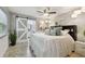 Inviting main bedroom featuring a sliding barn door, with ample natural light at 130 41St Ne Ave, St Petersburg, FL 33703