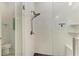 Modern bathroom featuring a glass-enclosed shower, subway tile, and sleek fixtures at 13034 Bliss Loop, Bradenton, FL 34211