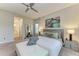 Comfortable bedroom with soft carpeting, natural light and a stylish decor at 13034 Bliss Loop, Bradenton, FL 34211