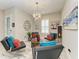 Stylish living room featuring modern decor, bright lighting, and comfortable seating at 13034 Bliss Loop, Bradenton, FL 34211