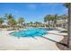 Beautiful pool featuring sun loungers and tables for residents at 14413 Seattle Slew Ln, Ruskin, FL 33573