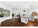 Open floor plan with bright and airy living spaces, gourmet kitchen, and stylish island at 15045 Wind Whisper Dr, Odessa, FL 33556