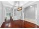 Elegant dining room featuring hardwood floors, recessed lighting, and open access to living spaces at 16522 Ivy Lake Dr, Odessa, FL 33556