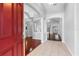 Welcoming foyer with tile flooring, high ceilings, and seamless flow into adjacent living spaces at 16522 Ivy Lake Dr, Odessa, FL 33556