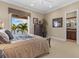 Cozy bedroom that leads to a bathroom and balcony at 1737 Brightwaters Ne Blvd, St Petersburg, FL 33704
