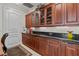 Walk-in pantry features custom cabinets, granite counters, and luxury appliances at 1737 Brightwaters Ne Blvd, St Petersburg, FL 33704