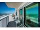 Spacious balcony overlooking the beach offers comfortable seating and breathtaking ocean views at 18650 Gulf Blvd # 601, Indian Shores, FL 33785