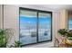 Through the sliding glass door, the balcony offers spectacular views of the ocean at 18650 Gulf Blvd # 601, Indian Shores, FL 33785