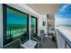 Relax and unwind on the balcony with stunning beach views and comfortable chairs at 18650 Gulf Blvd # 601, Indian Shores, FL 33785