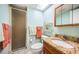 Bathroom featuring an enclosed shower, toilet and a granite countertop vanity at 18650 Gulf Blvd # 601, Indian Shores, FL 33785