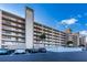 Multi-story condominium building featuring balconies and reserved parking spaces at 18650 Gulf Blvd # 601, Indian Shores, FL 33785
