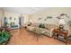 Comfortable living room with laminate floors, neutral walls, and a serene atmosphere at 18650 Gulf Blvd # 601, Indian Shores, FL 33785