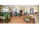 Open living space with a breakfast bar, dining area, and comfortable seating arrangement at 18650 Gulf Blvd # 601, Indian Shores, FL 33785