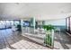 Bright lounge area offering seating, tile floors and views from large windows at 18650 Gulf Blvd # 601, Indian Shores, FL 33785