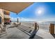 Relaxing beachfront patio with comfortable seating and ocean views at 18650 Gulf Blvd # 601, Indian Shores, FL 33785