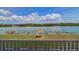 Balcony view of the community docks and waterfront at 19451 Gulf Blvd # 211, Indian Shores, FL 33785
