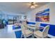 Living room with a view and coastal decor at 19451 Gulf Blvd # 211, Indian Shores, FL 33785
