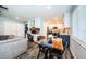 Open-concept kitchen and dining area with stainless appliances and custom cabinetry at 1965 Allard Dr, Clearwater, FL 33763