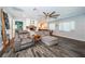 Living room with hardwood floors and seating at 1965 Allard Dr, Clearwater, FL 33763