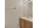 Clean half bathroom featuring a vanity, mirror, and modern towel rack at 20305 Oak Key Ct, Tampa, FL 33647