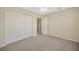 Cozy bedroom featuring carpet, neutral walls, and closet at 20305 Oak Key Ct, Tampa, FL 33647