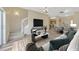 Open-concept living area showcasing a staircase, dining area, and modern decor at 20305 Oak Key Ct, Tampa, FL 33647