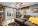 Cozy living room featuring hardwood floors, comfortable seating, and French doors that lead to another room at 230 32Nd N Ave, St Petersburg, FL 33704