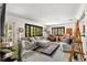 Bright and open living room with hardwood floors, comfortable seating, and stylish decor throughout at 230 32Nd N Ave, St Petersburg, FL 33704