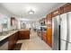 Spacious kitchen with granite countertops, tile floors, and stainless steel appliances at 2511 W Braddock St, Tampa, FL 33607