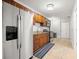 Well-equipped kitchen features modern stainless steel appliances and wood cabinets at 2511 W Braddock St, Tampa, FL 33607