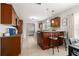 Charming kitchen with granite countertops, island seating, and stainless appliances at 2511 W Braddock St, Tampa, FL 33607