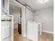 Practical laundry room with a washer, dryer and water heater, with ample storage at 2511 W Braddock St, Tampa, FL 33607
