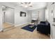 Comfortable living space featuring a desk, sofa, and stylish tiled floors at 2511 W Braddock St, Tampa, FL 33607