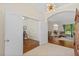 Elegant foyer leading to a formal dining area and office with hardwood floors at 26249 Sword Dancer Dr, Wesley Chapel, FL 33544
