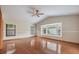 Spacious bedroom features hardwood flooring and ample natural light at 2664 Frisco Dr, Clearwater, FL 33761