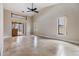 Spacious bedroom with tile flooring, vaulted ceiling, multiple windows and sliding doors to an outdoor area at 2664 Frisco Dr, Clearwater, FL 33761