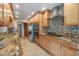 Gourmet kitchen featuring stainless appliances, tile backsplash, and ample cabinet space at 2664 Frisco Dr, Clearwater, FL 33761