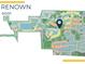 Aerial view of the community showing ponds, walking trails, community pool and numerous colorful residential areas at 27052 Paradise Shores Dr, Englewood, FL 34223