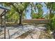 Large backyard featuring mature trees at 2821 Marconi St, Tampa, FL 33605
