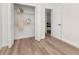 Bedroom closet with open shelving and neutral decor at 3728 Cypress Meadows Rd, Tampa, FL 33624