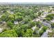 Aerial view of houses and greenery in a charming neighborhood at 37401 Magnolia Ave, Dade City, FL 33523