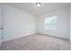 Bedroom with neutral carpet, natural light and a large window at 3844 Silverlake Way, Wesley Chapel, FL 33544