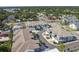 Drone shot highlights new residential construction, with a focus on symmetrical layouts and modern design at 414 Finn Way # 4, Dunedin, FL 34698