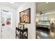 Hallway view into bright bedroom with hard wood floors and neutral decor at 4161 Rolling Springs Dr, Tampa, FL 33624