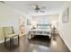 Bedroom features hardwood floors, neutral color scheme, and ensuite bathroom at 4161 Rolling Springs Dr, Tampa, FL 33624