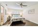 Comfortable bedroom with decorative pillows and shiplap shutters for a modern feel at 4161 Rolling Springs Dr, Tampa, FL 33624