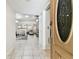 Bright foyer that leads to a spacious living area with neutral tones and ample natural light at 4161 Rolling Springs Dr, Tampa, FL 33624