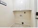 A functional laundry room area provides convenience with added storage, and laundry hookups at 4161 Rolling Springs Dr, Tampa, FL 33624