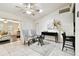 Inviting living room with neutral color palette, decorative accents, and tile flooring throughout at 4161 Rolling Springs Dr, Tampa, FL 33624