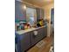 Functional kitchen featuring ample countertop space, modern appliances, and plenty of storage at 4581 Deltona Blvd, Spring Hill, FL 34606